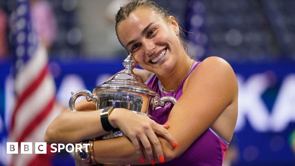 Aryna Sabalenka hugs US Open trophy