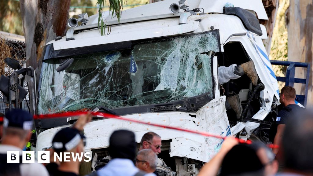 One dead, dozens injured after truck hits Israel bus stop